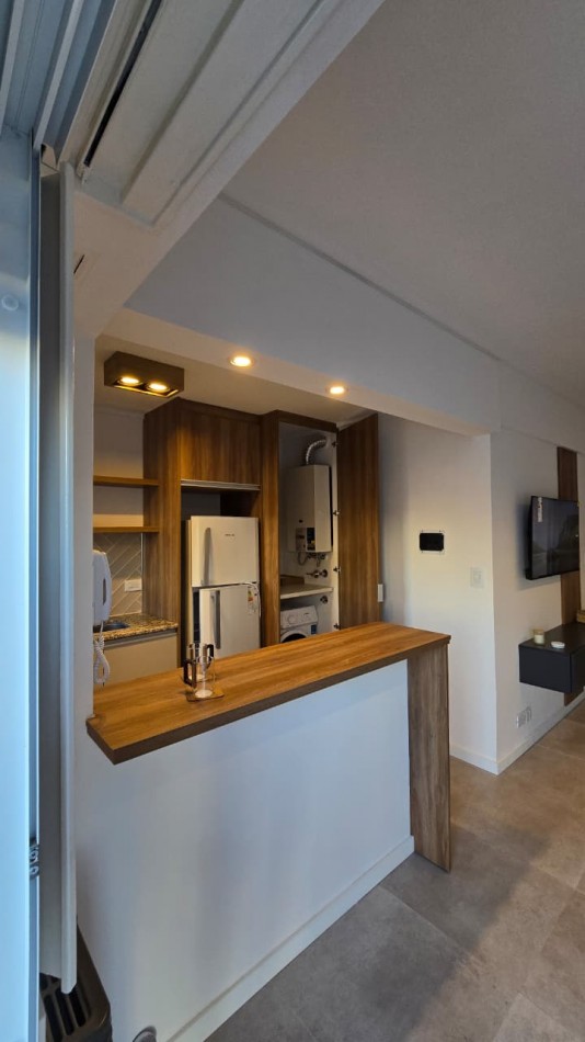 DEPARTAMENTO 2 AMBIENTES RECICLADO CON MUEBLES Y COCHERA CUBIERTA