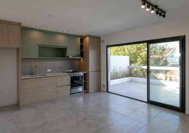 DEPARTAMENTO DE 2 AMBIENTES CON TERRAZA Y PARRILLA.