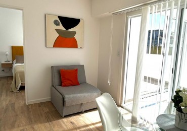 DEPARTAMENTO DE 2 AMBIENTES AL FRENTE. 2 TERRAZAS, QUINCHO Y PARRILLA. VISTA LATERAL AL MAR. ZONA GUEMES